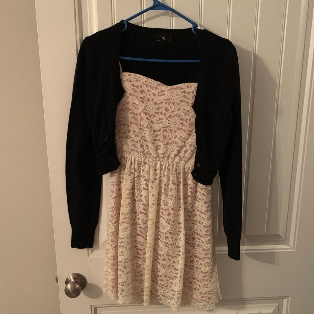 Strapless cream lace dress with cardigan.